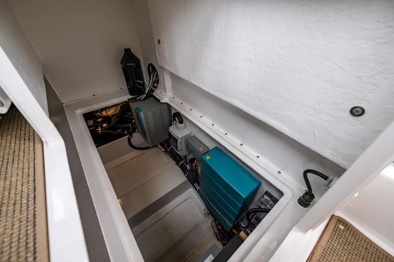 Slide: The Image of Engine compartment of 2022 Nimbus C11 boat, showcasing electrical components and wiring. - 28