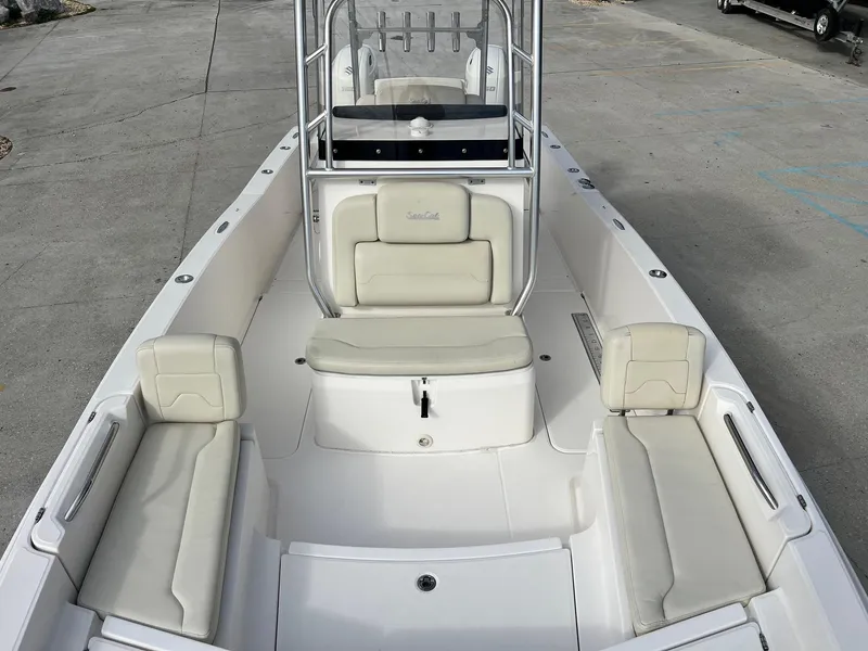 Slide: The Image of 2019 Sea Cat 260 boat interior with white seating and center console. - 11