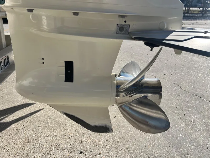 Slide: The Image of Sea Cat 260 2019 boat propeller in sunlight, showcasing sleek design and metallic finish. - 6