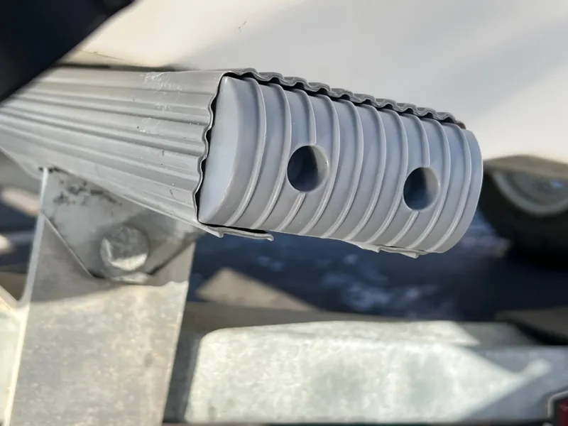 Slide: The Image of Close-up of a 2016 Boston Whaler 150 Super Sport boat's ribbed rubber bumper. - 5