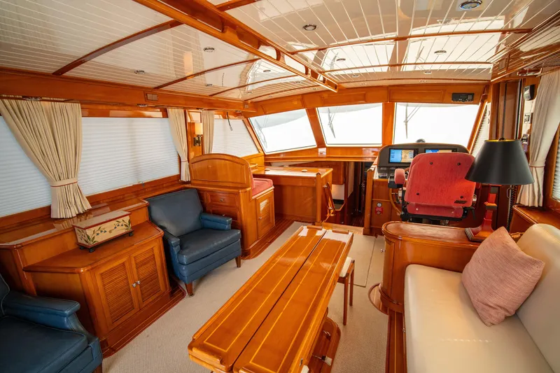 Slide: The Image of Luxurious interior of 2004 Grand Banks 58 Eastbay FB yacht with elegant wood finish. - 16