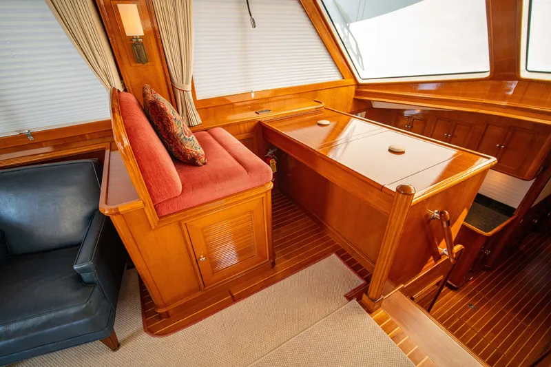 Slide: The Image of Interior of 2004 Grand Banks 58 Eastbay FB with wood finish and seating area. - 22