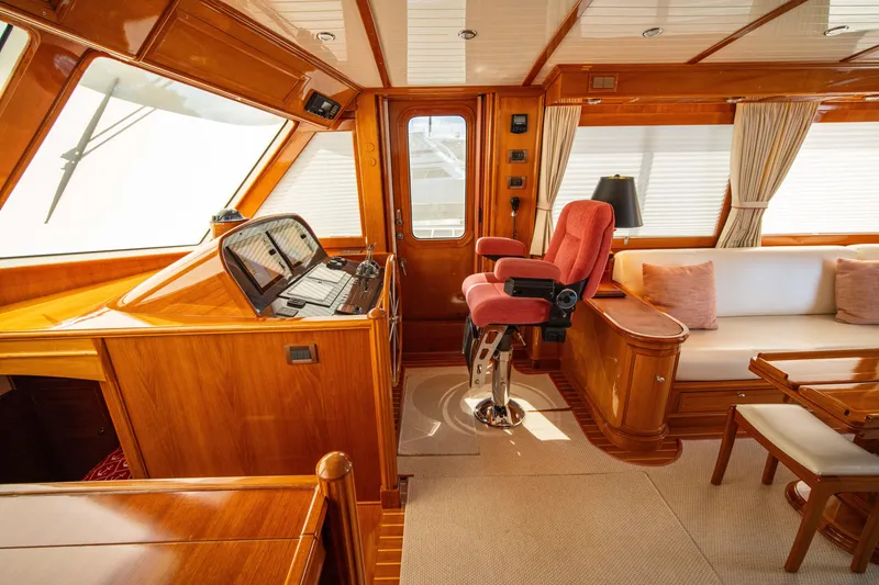 Slide: The Image of Luxurious interior of 2004 Grand Banks 58 Eastbay FB yacht with wood finish and seating. - 26