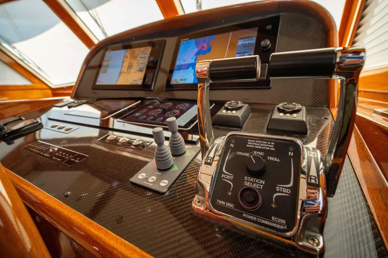 Slide: The Image of Control panel of 2004 Grand Banks 58 Eastbay FB yacht with navigation screens. - 32