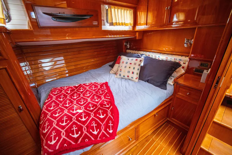 Slide: The Image of Luxurious cabin interior of 2004 Grand Banks 58 Eastbay FB yacht with cozy bedding. - 41