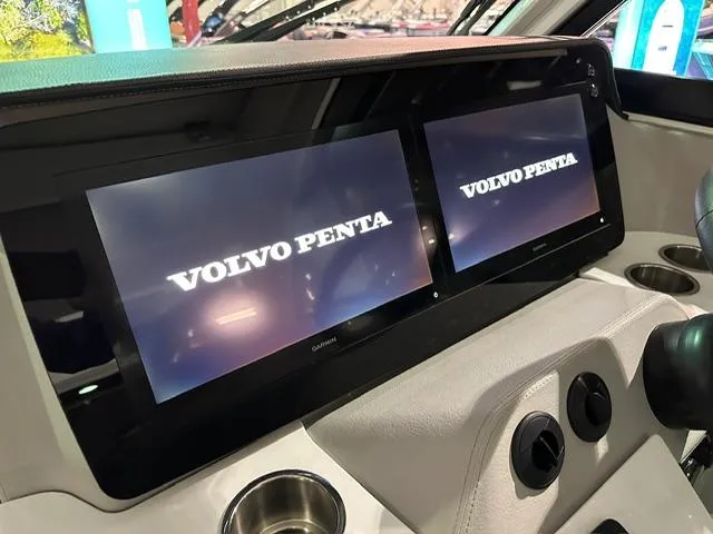 Slide: The Image of 2025 Regal LS36 dashboard featuring dual Volvo Penta displays. - 12