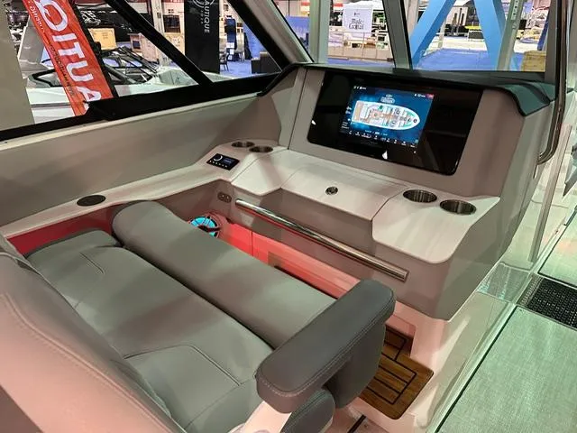 Slide: The Image of 2025 Regal LS36 boat interior with modern dashboard and touchscreen display. - 14