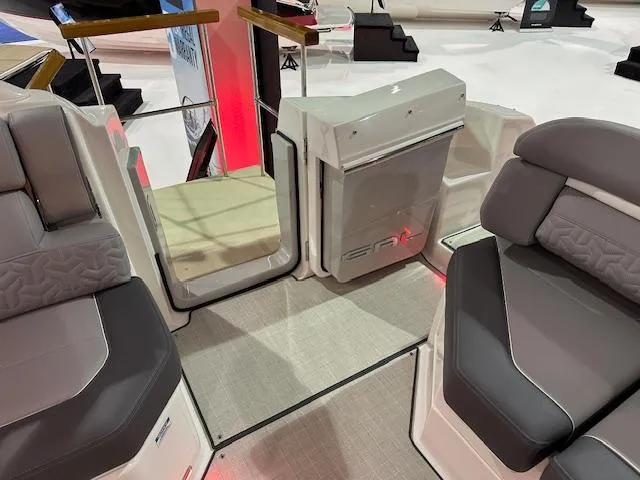 Slide: The Image of 2025 Regal LS36 boat interior with modern seating and sleek design. - 22