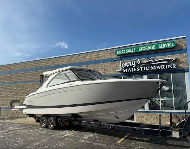 Slide: The Image of 2025 Regal LS36 boat on trailer at Jerry's Majestic Marine dealership. - 35