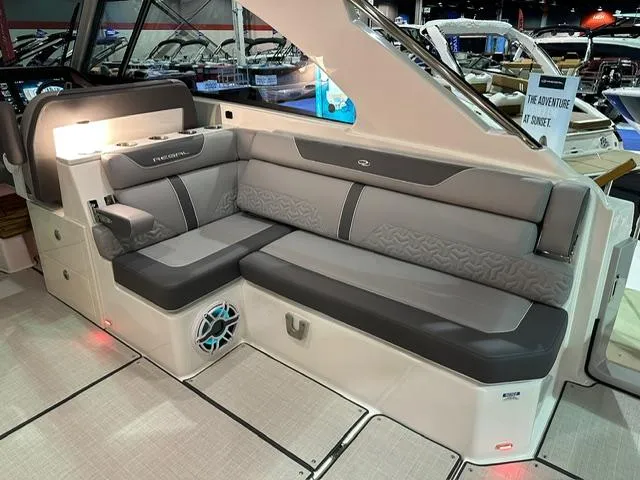 Slide: The Image of 2025 Regal LS36 boat interior with gray seating and modern design. - 5