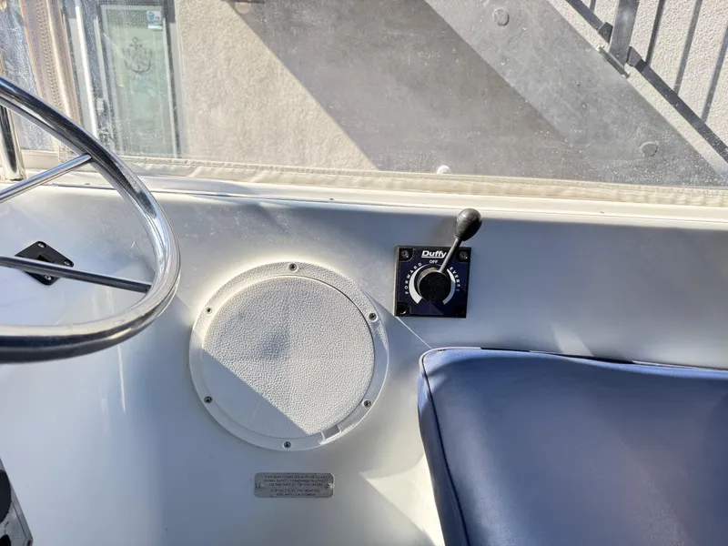 Slide: The Image of Interior of 2022 Duffy Sun Cruiser showing steering wheel and control panel. - 14