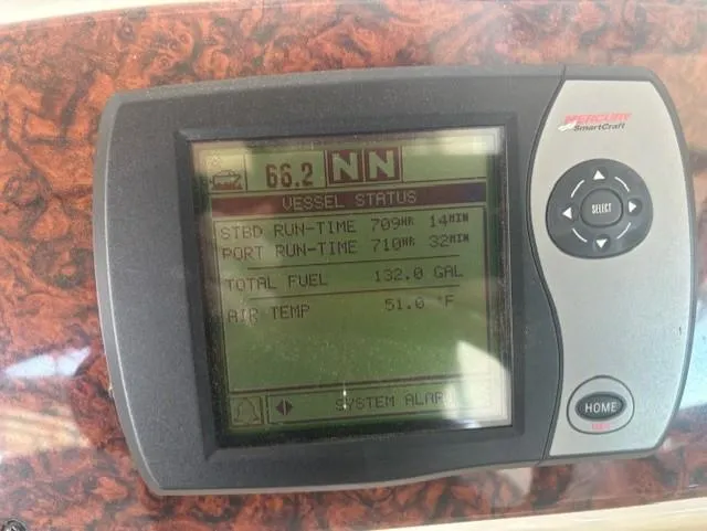 Slide: The Image of Display screen on 2005 Sea Ray 300 Sundancer showing vessel status and fuel information. - 29