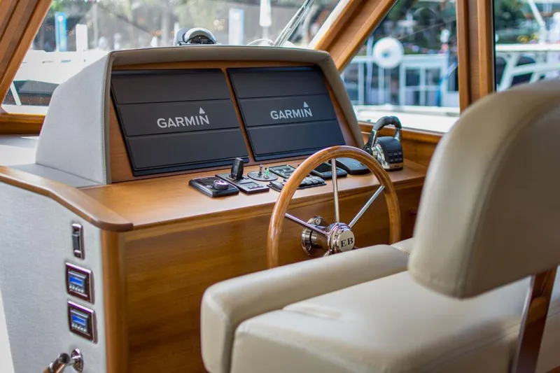 Slide: The Image of Helm of 2025 Eastbay EB44 boat with Garmin navigation displays. - 8