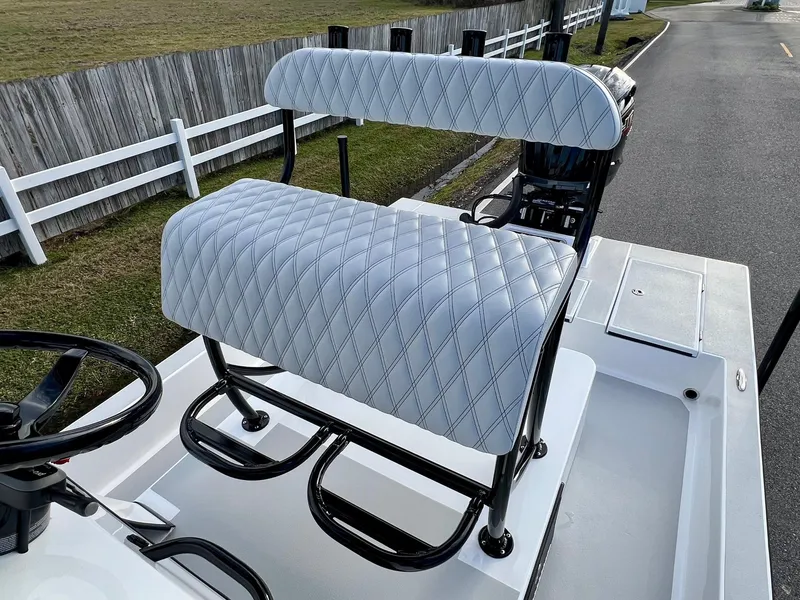 Slide: The Image of 2025 Shallow Sport 24 Sport boat seat with diamond-pattern upholstery. - 9