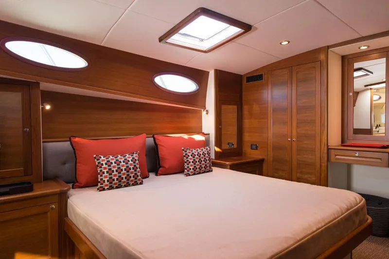 Slide: The Image of Luxurious cabin interior of 2026 Palm Beach Motor Yachts PB65 with elegant wood finish. - 14