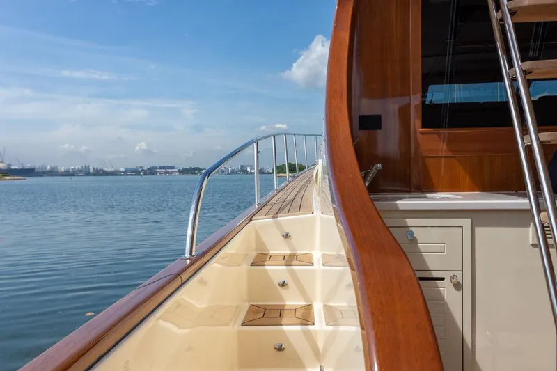 Slide: The Image of 2026 Palm Beach Motor Yachts PB65, elegant deck view, luxury yacht on calm waters. - 17