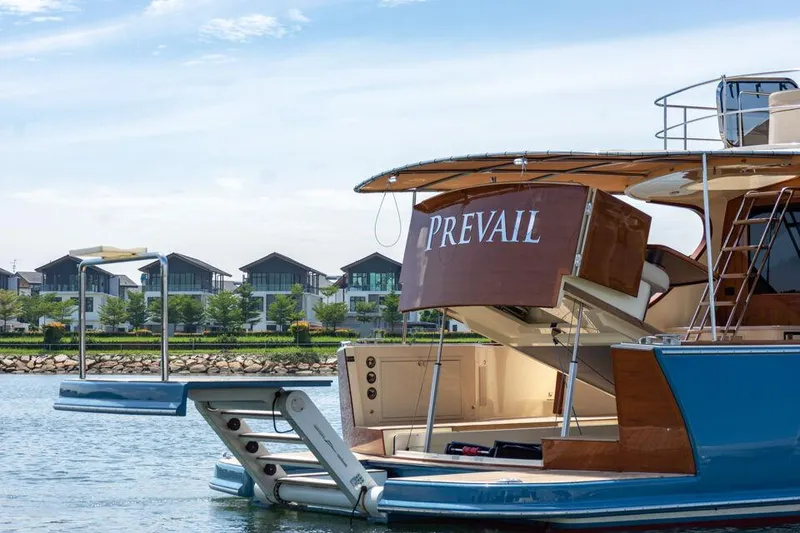 Slide: The Image of 2026 Palm Beach Motor Yachts PB65 docked, featuring elegant design and luxurious amenities. - 18