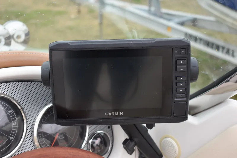 Slide: The Image of Garmin navigation system on 2009 Chris-Craft Corsair 25 dashboard. - 22