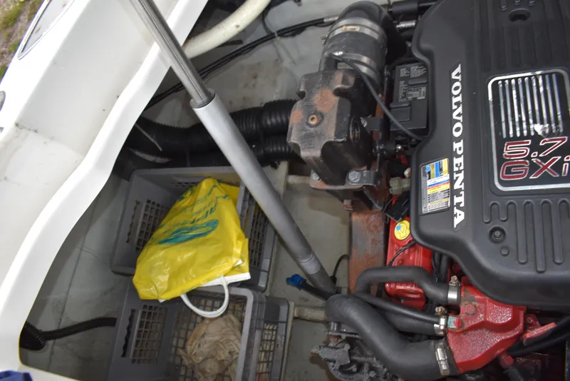 Slide: The Image of Engine compartment of 2009 Chris-Craft Corsair 25 with Volvo Penta 5.7 GXI engine. - 31