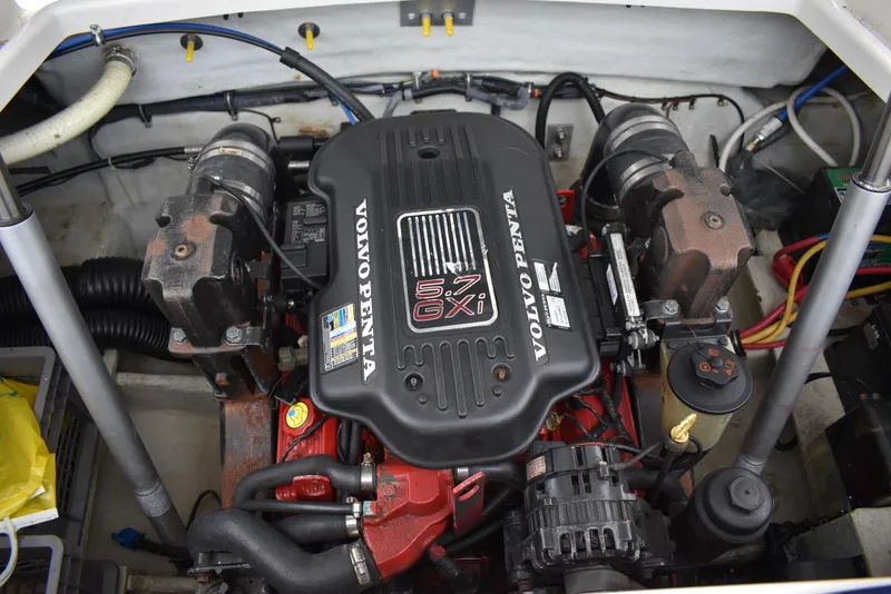 Slide: The Image of 2009 Chris-Craft Corsair 25 engine compartment with Volvo Penta 5.7 GXI engine. - 32