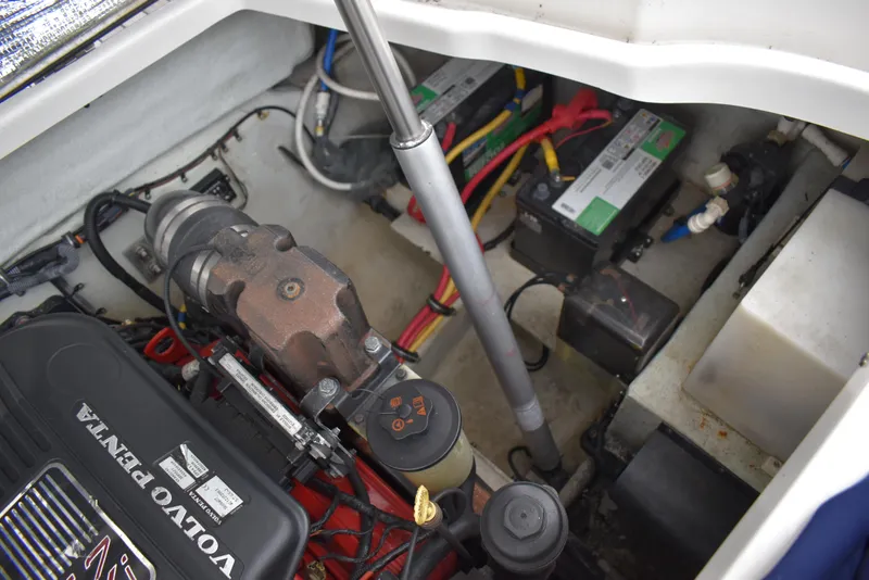 Slide: The Image of Engine compartment of 2009 Chris-Craft Corsair 25 with Volvo Penta engine and batteries. - 33