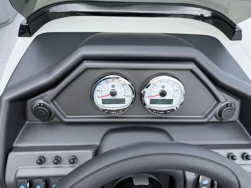 Slide: The Image of Dashboard of 2025 Bentley Pontoons 20 Legacy with dual gauges and controls. - 10