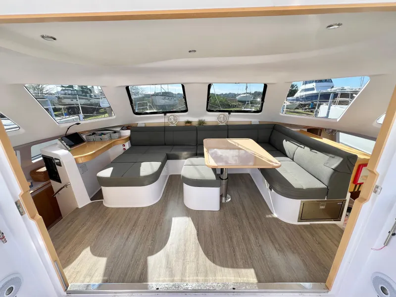 Slide: The Image of Modern interior of 2020 Seawind 1260 catamaran with spacious seating and natural light. - 26