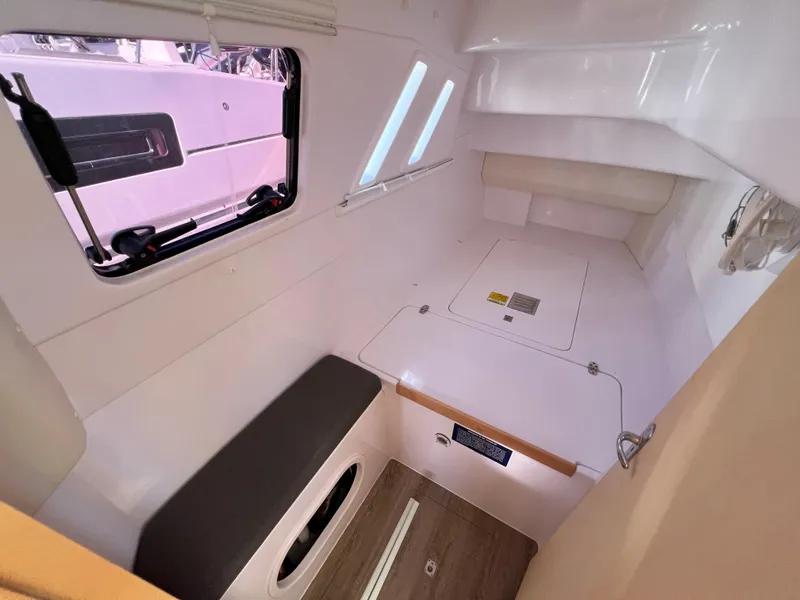 Slide: The Image of Interior cabin of 2020 Seawind 1260 catamaran with cozy bed and windows. - 85