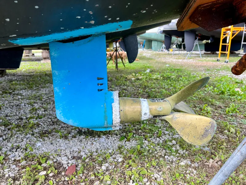 Slide: The Image of Seawind 1260 catamaran mast and rigging, 2020 model, in a boatyard setting. - 92