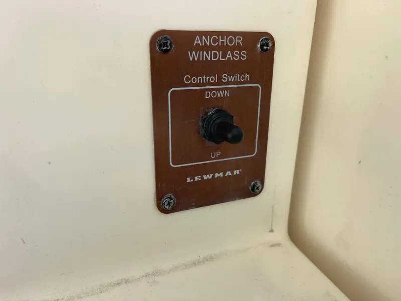 Slide: The Image of Anchor windlass control switch on 2003 Pursuit 2870 Walkaround boat. - 24