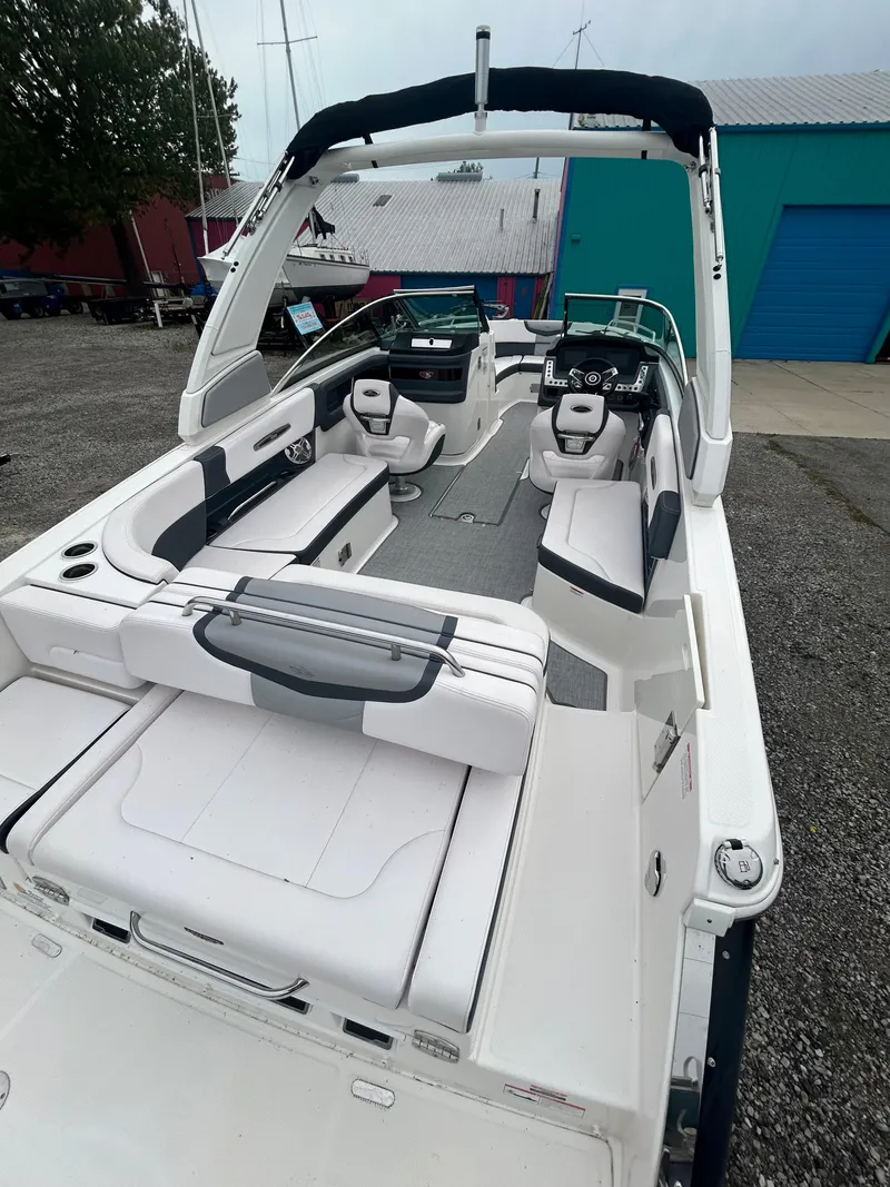 Slide: The Image of 2019 Chaparral 277 SSX boat with spacious seating and sleek design. - 15