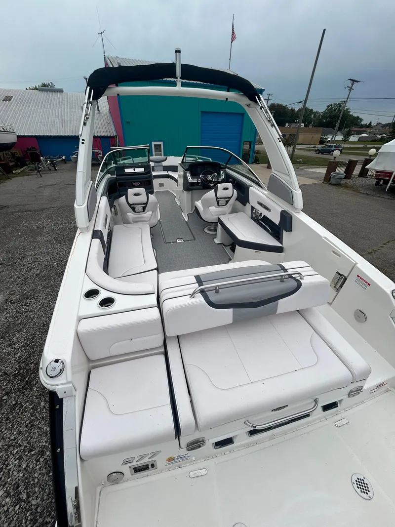 Slide: The Image of 2019 Chaparral 277 SSX boat with spacious seating and sleek design. - 16