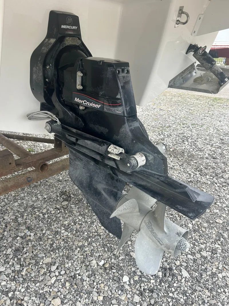 Slide: The Image of 2019 Chaparral 277 SSX boat with MerCruiser outdrive on gravel surface. - 33