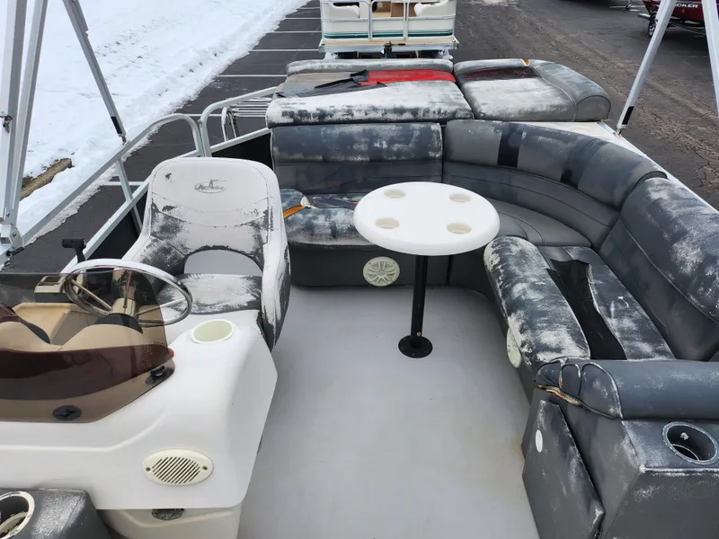 Slide: The Image of 2010 Misty Harbor 2085CR Adventure Cruiser with snow-covered seating and table. - 11