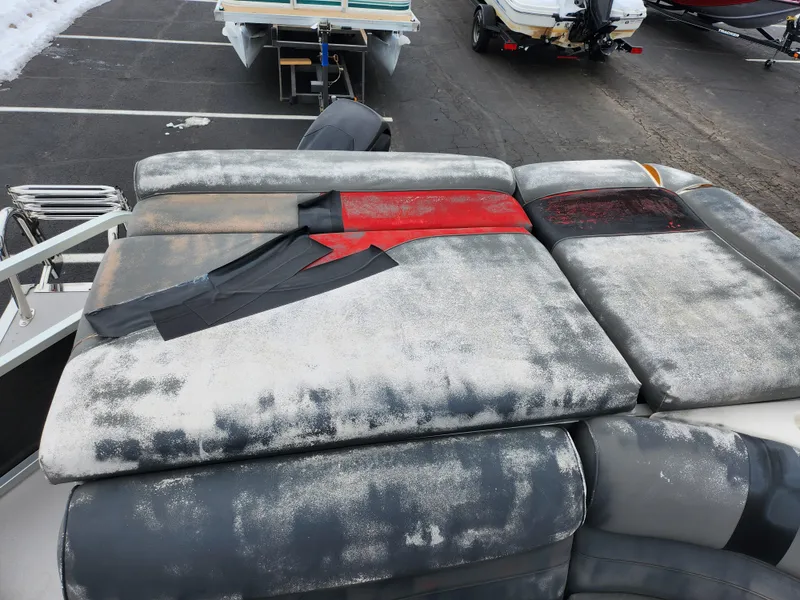 Slide: The Image of Worn seating on 2010 Misty Harbor 2085CR Adventure Cruiser, showing weathered upholstery and duct tape repairs. - 13