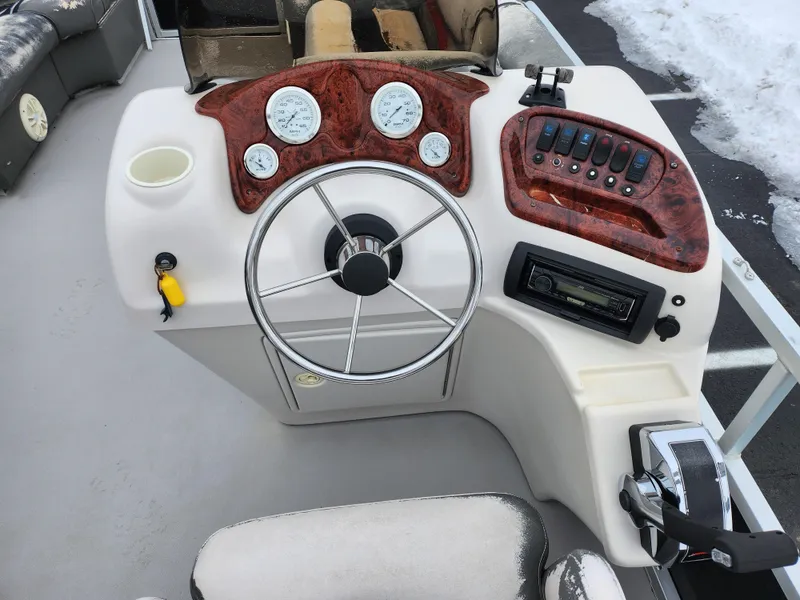 Slide: The Image of 2010 Misty Harbor 2085CR Adventure Cruiser dashboard with steering wheel and controls. - 17