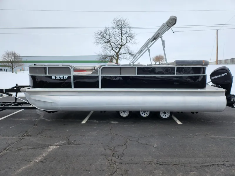 Slide: The Image of 2010 Misty Harbor 2085CR Adventure Cruiser pontoon boat in parking lot. - 4