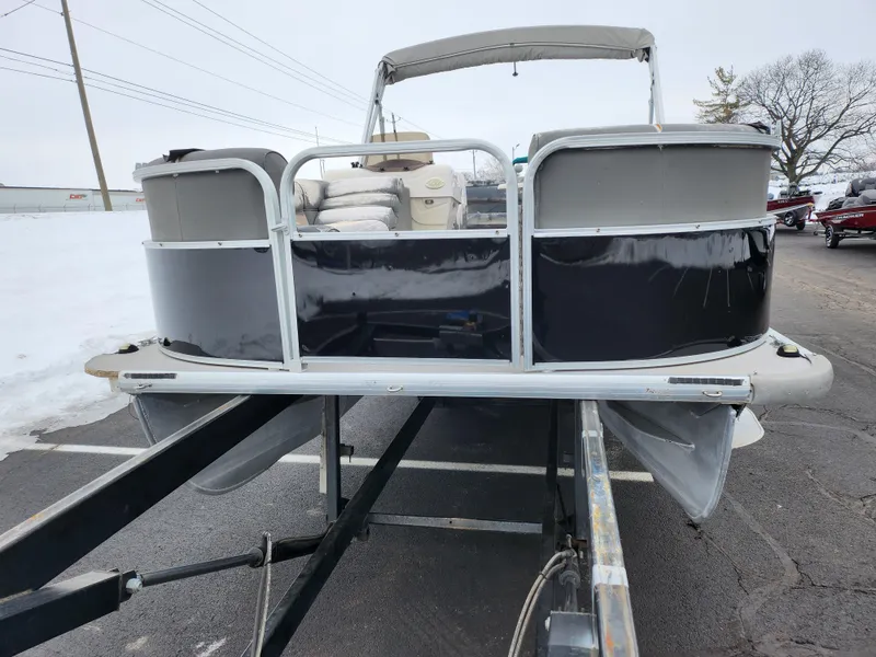 Slide: The Image of 2010 Misty Harbor 2085CR Adventure Cruiser pontoon boat on trailer, winter setting. - 6