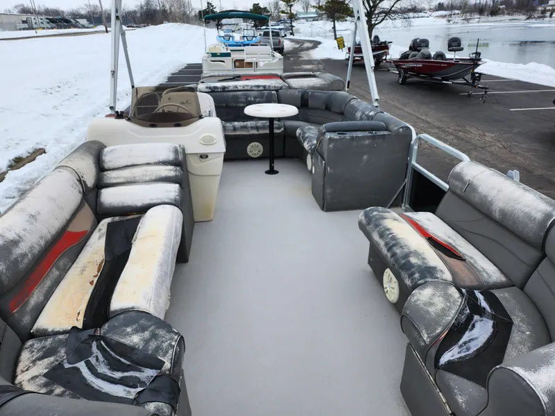 Slide: The Image of 2010 Misty Harbor 2085CR Adventure Cruiser with worn seating, parked by a snowy lakeside. - 9