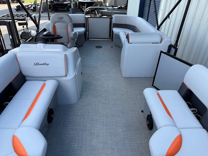Slide: The Image of 2025 Bentley Pontoons Bolt 203 interior with modern seating and sleek design. - 16