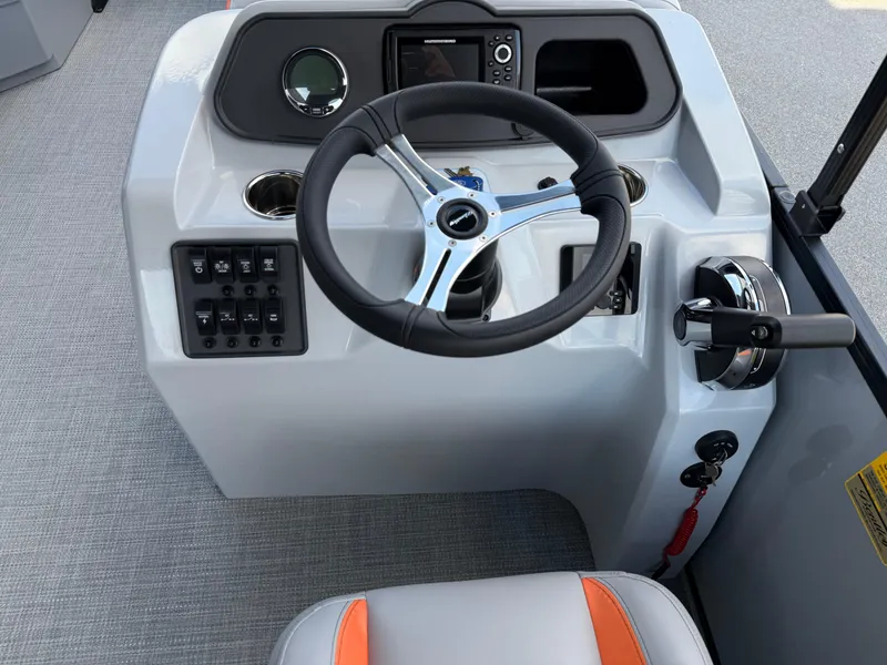 Slide: The Image of 2025 Bentley Pontoons Bolt 203 dashboard with steering wheel and control panel. - 23