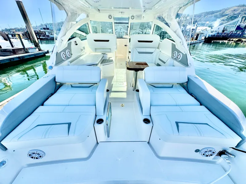 Slide: The Image of 2025 Tiara Yachts 34 LX interior with luxurious seating and modern design. - 40