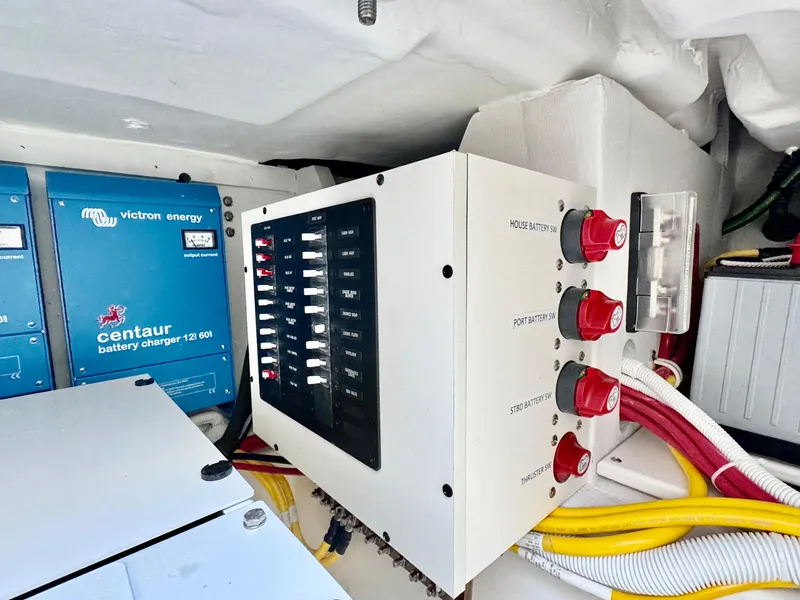 Slide: The Image of Electrical panel and battery charger in 2025 Tiara Yachts 34 LX. - 42
