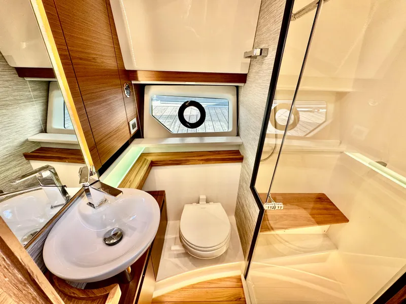 Slide: The Image of Luxurious bathroom interior of 2025 Tiara Yachts 43 LE, featuring modern fixtures and elegant design. - 43