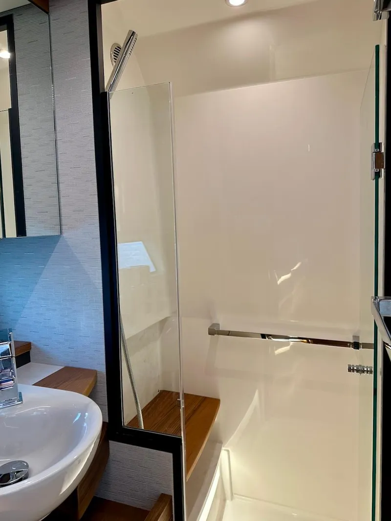Slide: The Image of Modern bathroom interior of 2025 Tiara Yachts 48 LE with sleek shower design. - 37