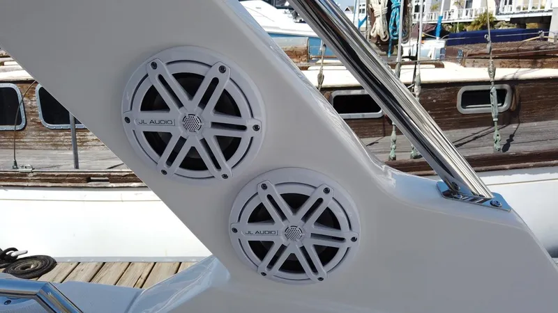 Slide: The Image of 2024 Tiara Sport 34LS boat with JL Audio speakers on deck. - 35