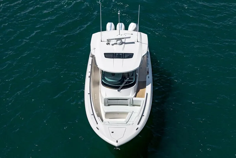 Slide: The Image of 2024 Tiara Yachts 38 LS on water, aerial view showcasing sleek design. - 12