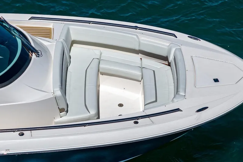 Slide: The Image of 2024 Tiara Yachts 38 LS boat with spacious seating on blue water. - 15