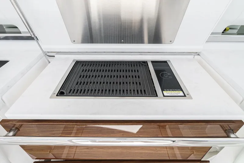 Slide: The Image of 2024 Tiara Yachts 38 LS grill station with sleek design and modern features. - 39