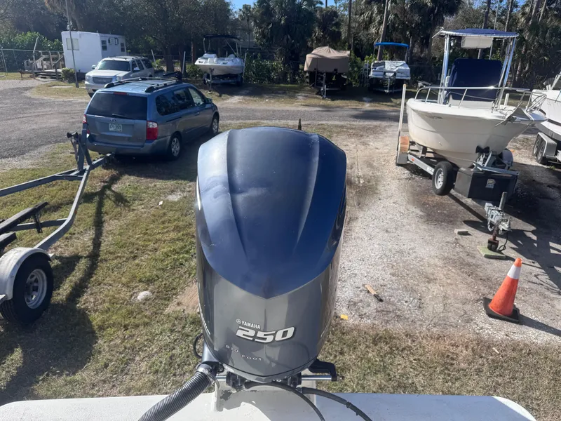 Slide: The Image of Yamaha 250 outboard motor on a 2005 Parker 2520 Deep Vee Sport Cabin boat. - 17